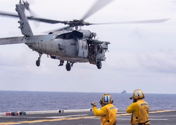 USS America (LHA 6) And 31st Marine Expeditionary Unit Conduct Flight Ops and VBSS Exercise