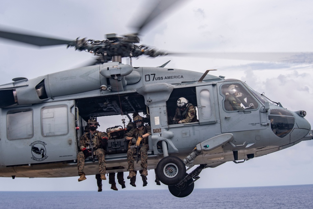 USS America (LHA 6) And 31st Marine Expeditionary Unit Conduct Flight Ops and VBSS Exercise