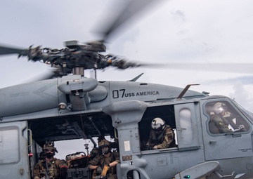 USS America (LHA 6) And 31st Marine Expeditionary Unit Conduct Flight Ops and VBSS Exercise
