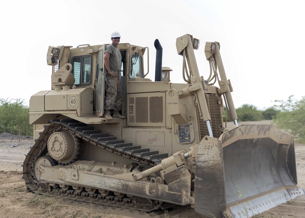 760TH EVCC CLEARS BRUSH