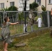 U.S. Army Solders play football with orphanage children