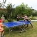 Soldiers Playing Ping Pong with Polish Children