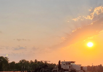 1158th Transportation Company and a sunset