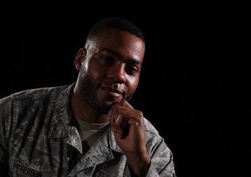 Team Whiteman Airman poses for a photo