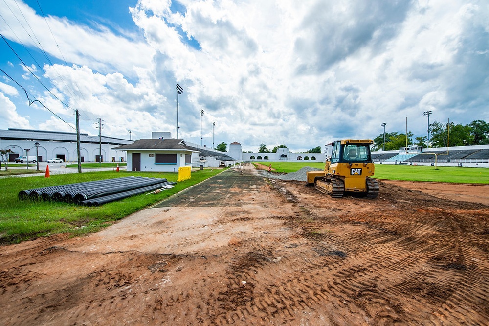 Workers to extend length of Doughboy Stadium running track,  put in new surface, drainage