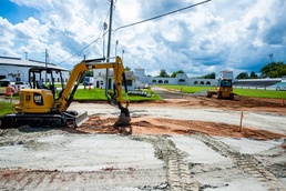 Workers to extend length of Doughboy Stadium running track,  put in new surface, drainage