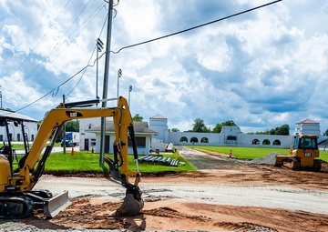 Workers to extend length of Doughboy Stadium running track,  put in new surface, drainage