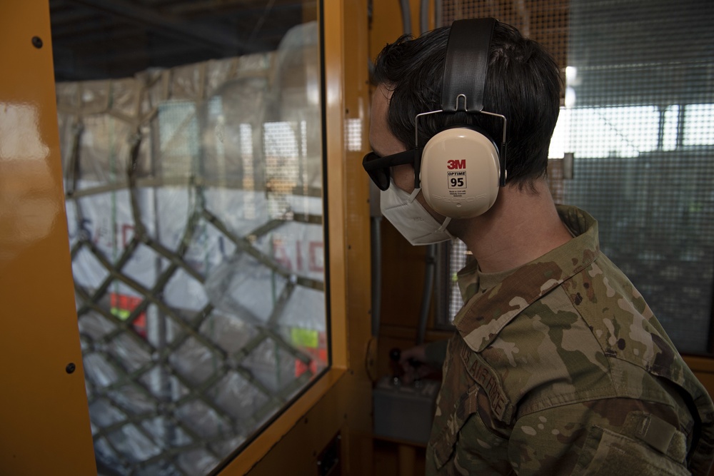 Indonesia; USAID; COVID-19; 21st Airlift Squadron; 60th Aerial Port Squadron