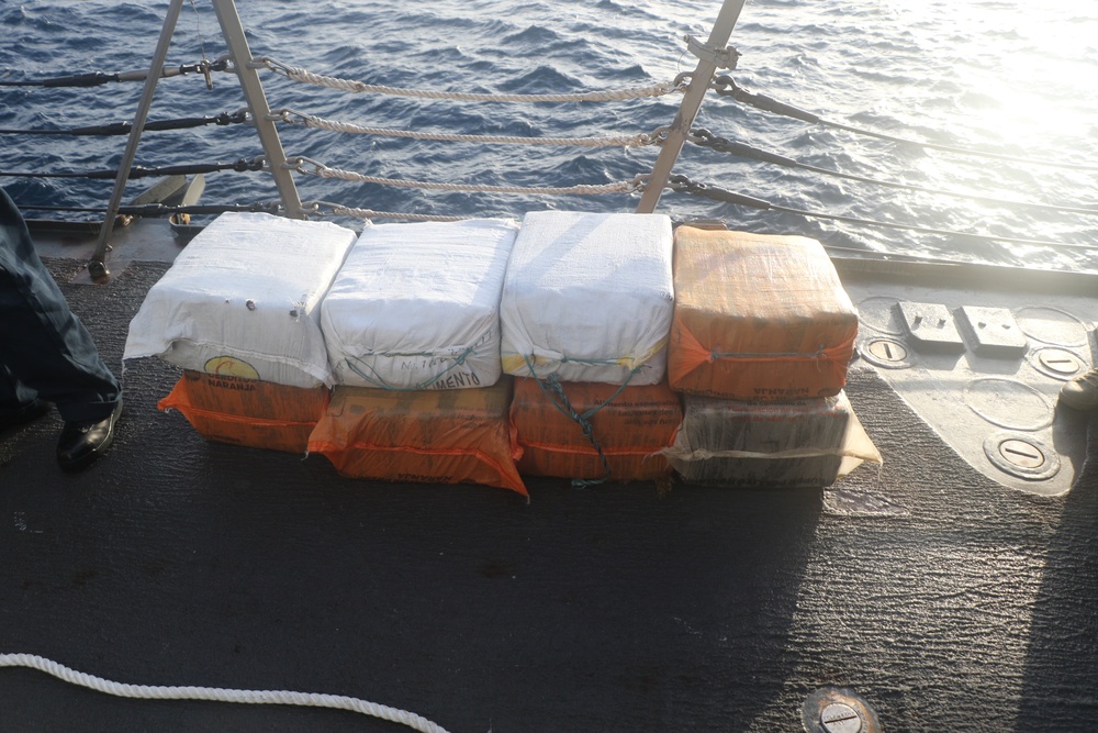 USS Kidd (DDG 100) , Coast Guard LEDET 401 apprehend 3 smugglers, seize $6 million in cocaine following interdiction of smuggling go-fast in the Caribbean Sea