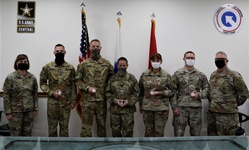 1107th TASMG Soldiers Coined by 311th ESC CG and CSM [Image 1 of 3]