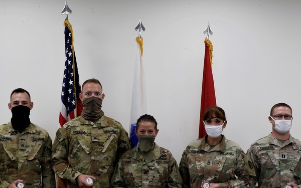 1107th TASMG Soldiers Coined by 311th ESC CG and CSM