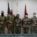 1107th TASMG Soldiers Coined by 311th ESC CG and CSM