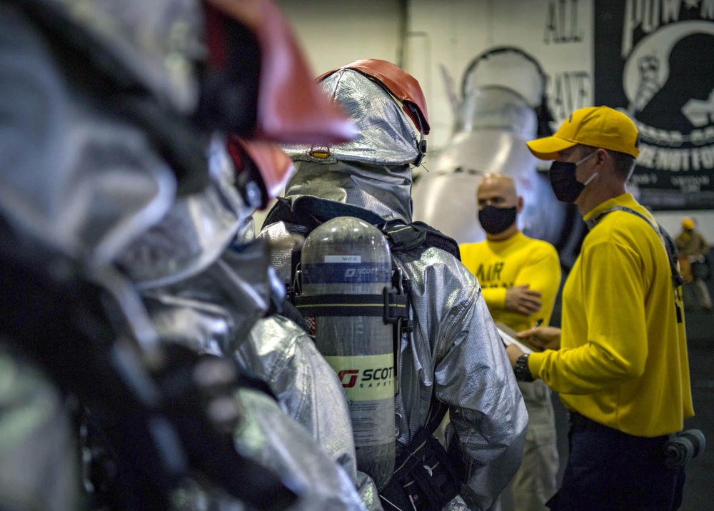 USS Carl Vinson (CVN 70) Sailors Participate In Aircraft Fire Drill