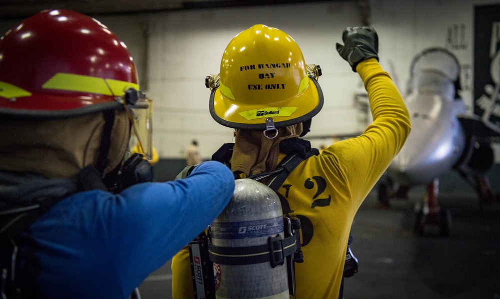 USS Carl Vinson (CVN 70) Sailors Participate In Aircraft Fire Drill