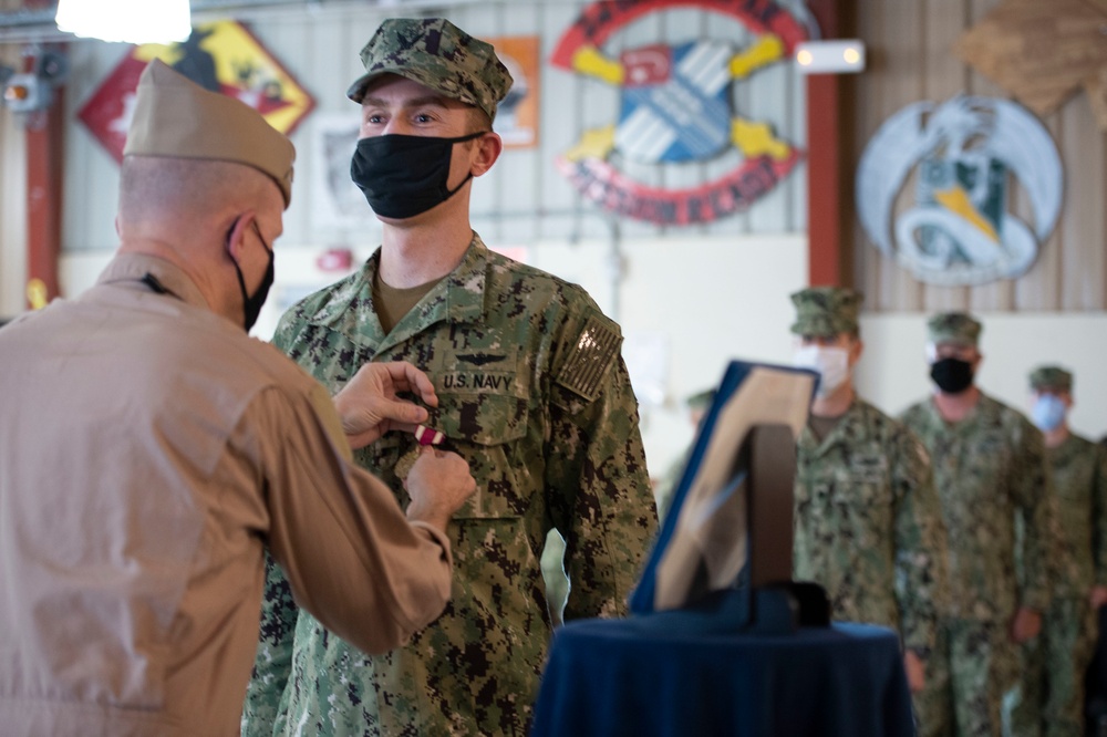 CAMP LEMONNIER HOLDS AWARDS CEREMONY PINNING SAILORS, SOLDIERS