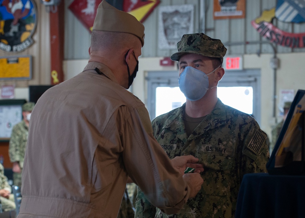 CAMP LEMONNIER HOLDS AWARDS CEREMONY PINNING SAILORS, SOLDIERS