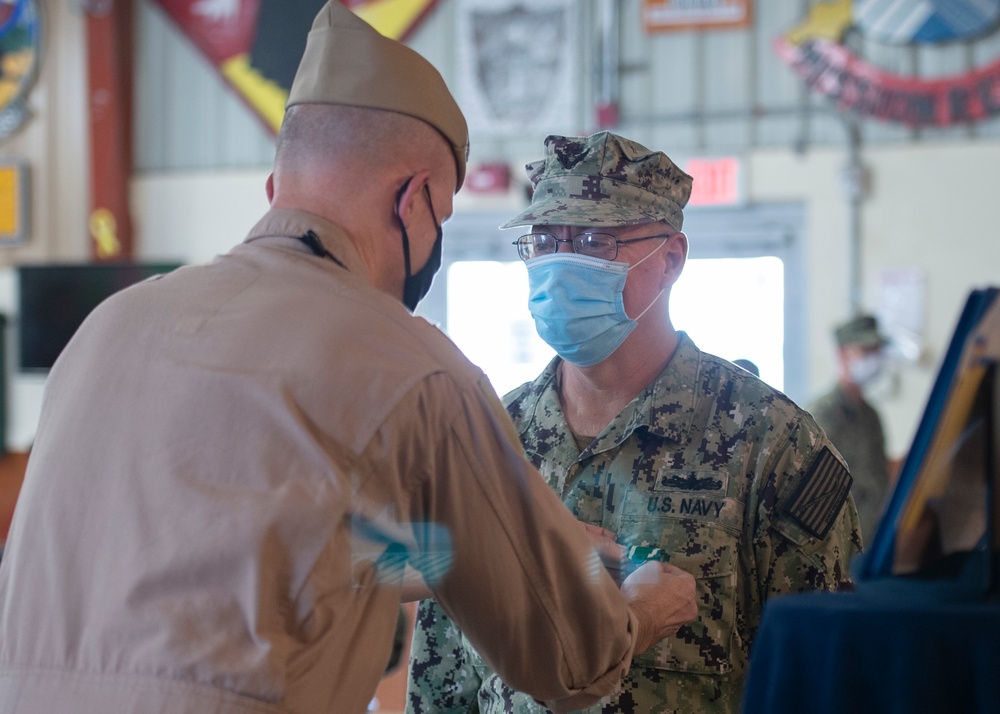 CAMP LEMONNIER HOLDS AWARDS CEREMONY PINNING SAILORS, SOLDIERS