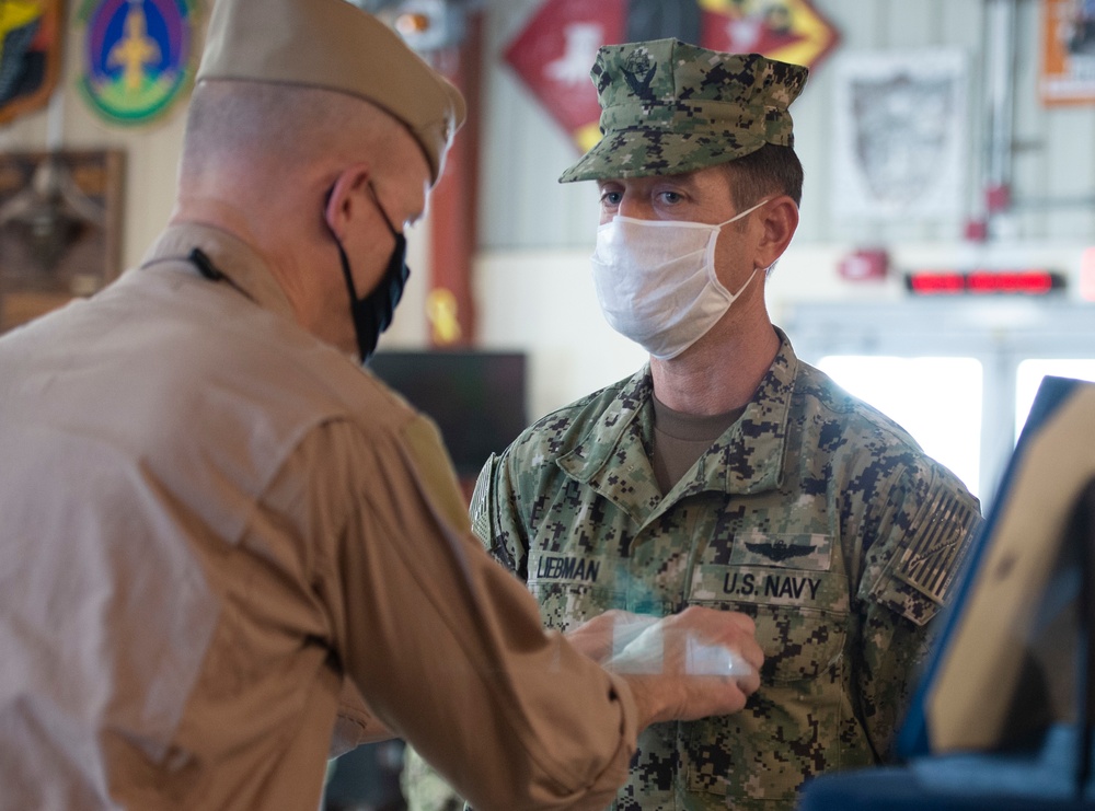 CAMP LEMONNIER HOLDS AWARDS CEREMONY PINNING SAILORS, SOLDIERS