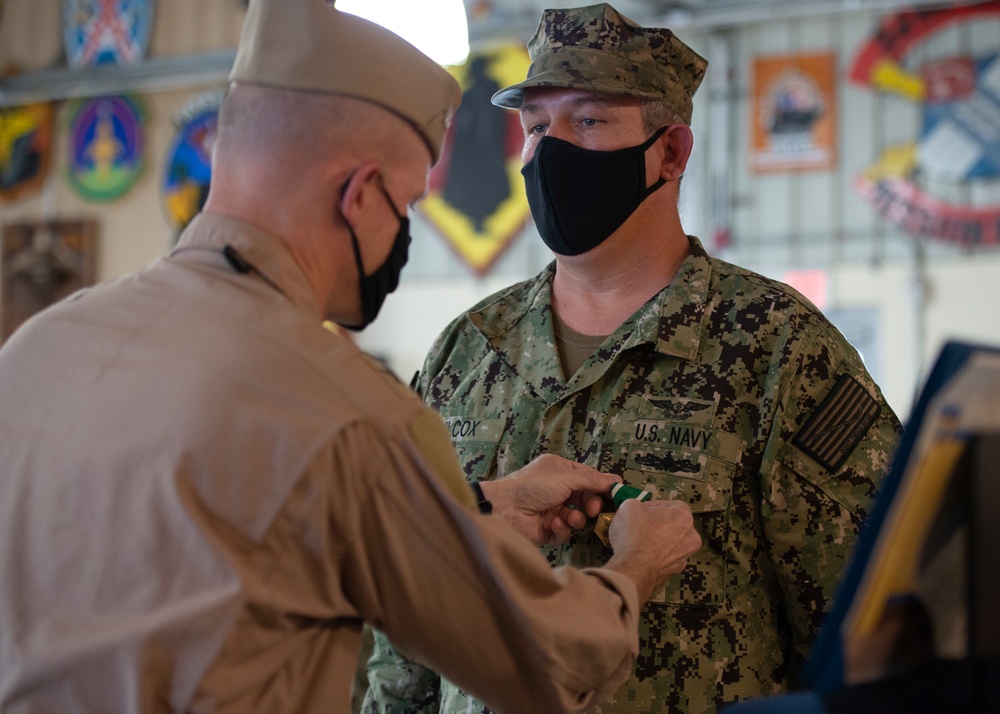 CAMP LEMONNIER HOLDS AWARDS CEREMONY PINNING SAILORS, SOLDIERS