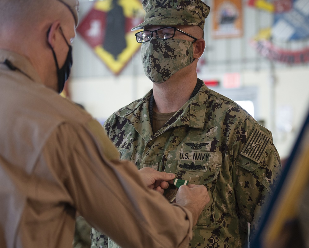 CAMP LEMONNIER HOLDS AWARDS CEREMONY PINNING SAILORS, SOLDIERS