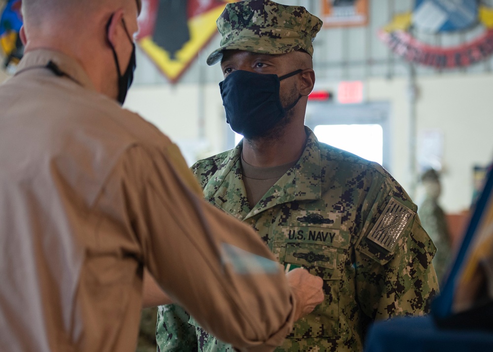 CAMP LEMONNIER HOLDS AWARDS CEREMONY PINNING SAILORS, SOLDIERS