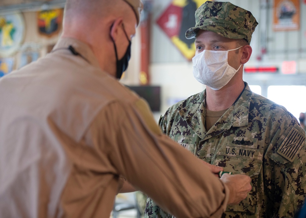 CAMP LEMONNIER HOLDS AWARDS CEREMONY PINNING SAILORS, SOLDIERS