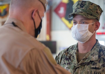 CAMP LEMONNIER HOLDS AWARDS CEREMONY PINNING SAILORS, SOLDIERS