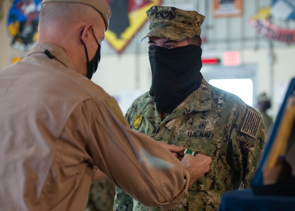 CAMP LEMONNIER HOLDS AWARDS CEREMONY PINNING SAILORS, SOLDIERS