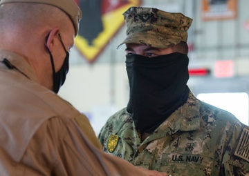 CAMP LEMONNIER HOLDS AWARDS CEREMONY PINNING SAILORS, SOLDIERS