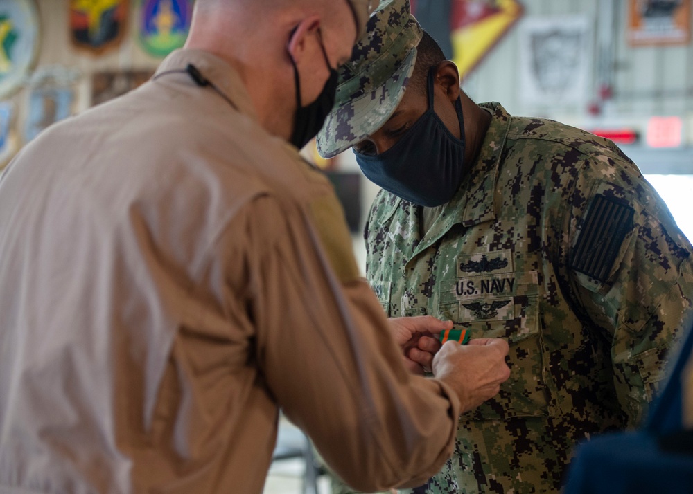 CAMP LEMONNIER HOLDS AWARDS CEREMONY PINNING SAILORS, SOLDIERS