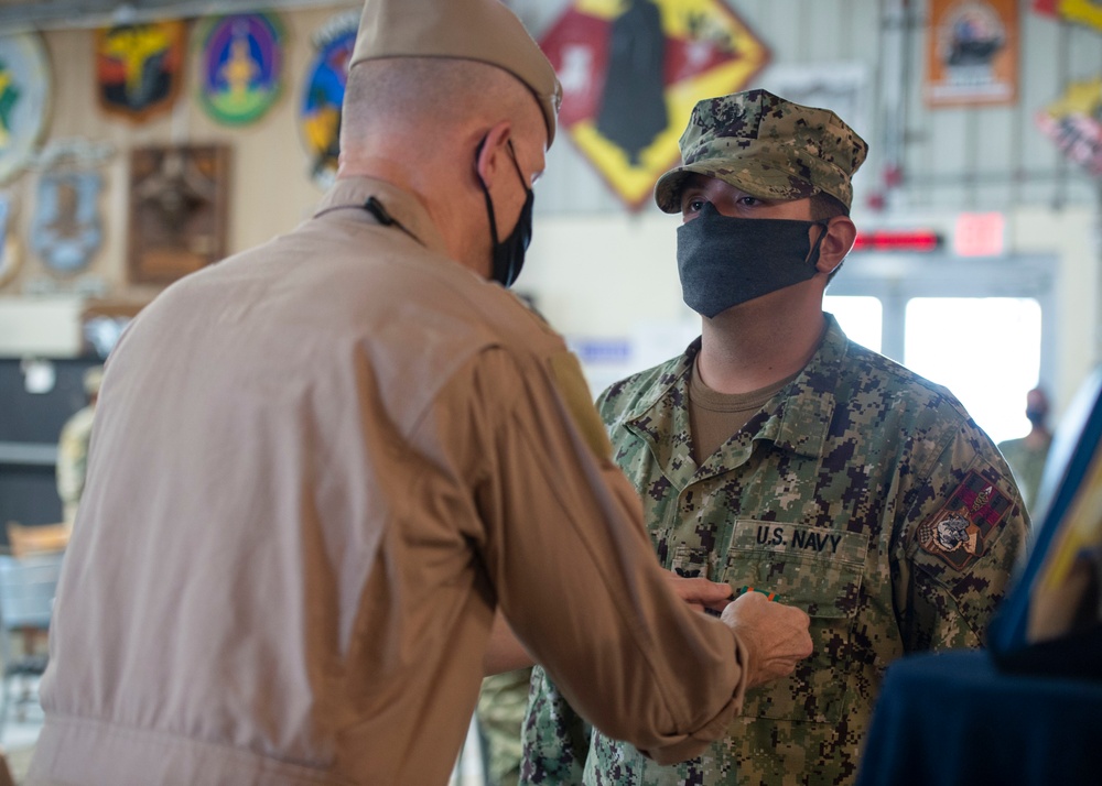 CAMP LEMONNIER HOLDS AWARDS CEREMONY PINNING SAILORS, SOLDIERS