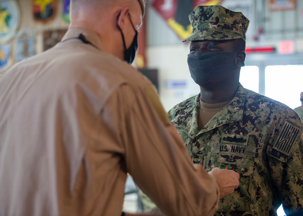 CAMP LEMONNIER HOLDS AWARDS CEREMONY PINNING SAILORS, SOLDIERS