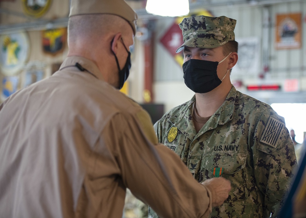 CAMP LEMONNIER HOLDS AWARDS CEREMONY PINNING SAILORS, SOLDIERS