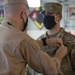 CAMP LEMONNIER HOLDS AWARDS CEREMONY PINNING SAILORS, SOLDIERS