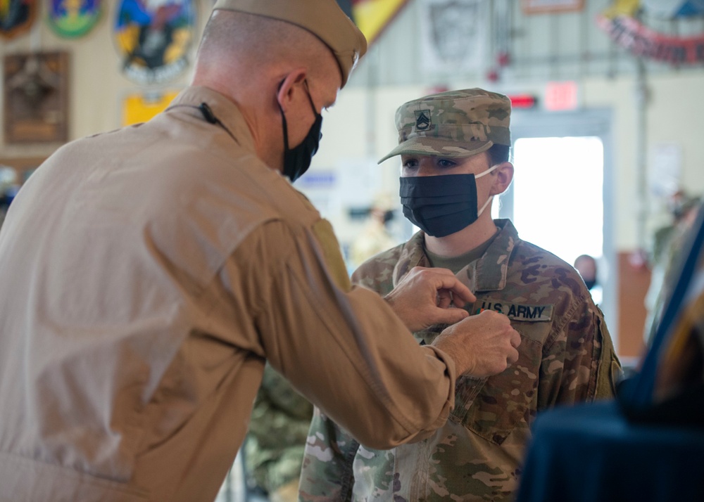 CAMP LEMONNIER HOLDS AWARDS CEREMONY PINNING SAILORS, SOLDIERS