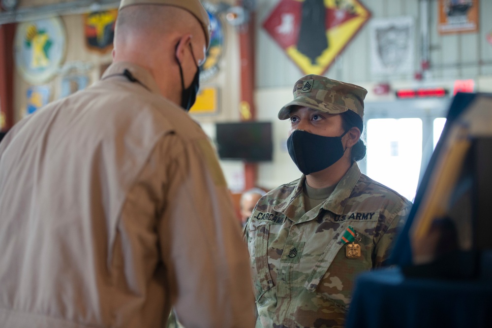 CAMP LEMONNIER HOLDS AWARDS CEREMONY PINNING SAILORS, SOLDIERS