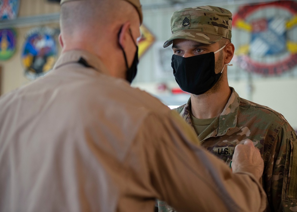 CAMP LEMONNIER HOLDS AWARDS CEREMONY PINNING SAILORS, SOLDIERS