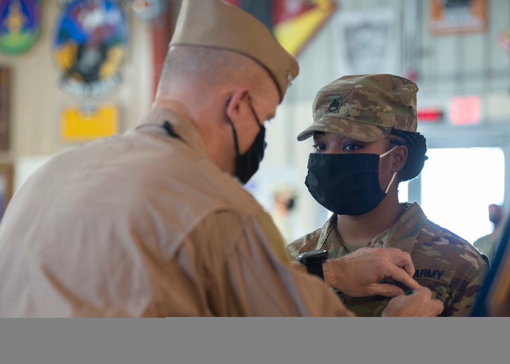 CAMP LEMONNIER HOLDS AWARDS CEREMONY PINNING SAILORS, SOLDIERS