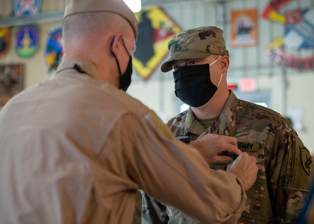 CAMP LEMONNIER HOLDS AWARDS CEREMONY PINNING SAILORS, SOLDIERS