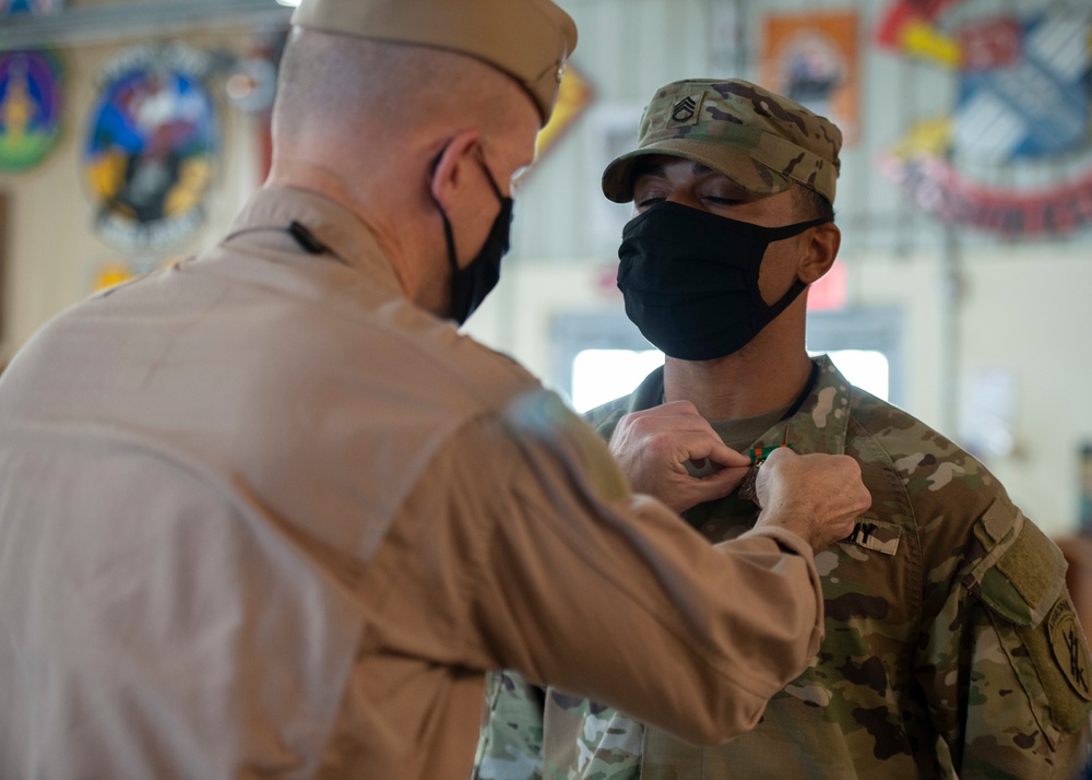 CAMP LEMONNIER HOLDS AWARDS CEREMONY PINNING SAILORS, SOLDIERS