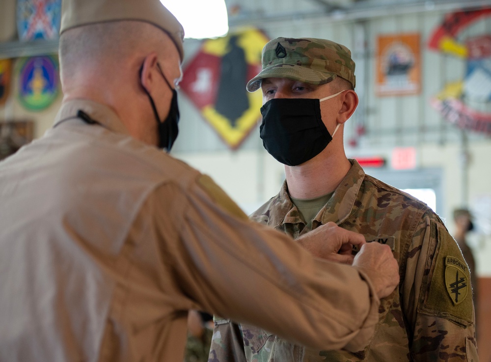 CAMP LEMONNIER HOLDS AWARDS CEREMONY PINNING SAILORS, SOLDIERS