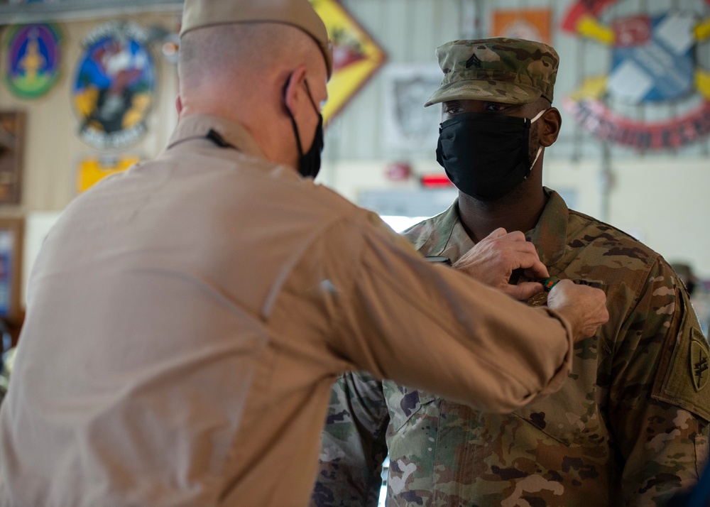 CAMP LEMONNIER HOLDS AWARDS CEREMONY PINNING SAILORS, SOLDIERS