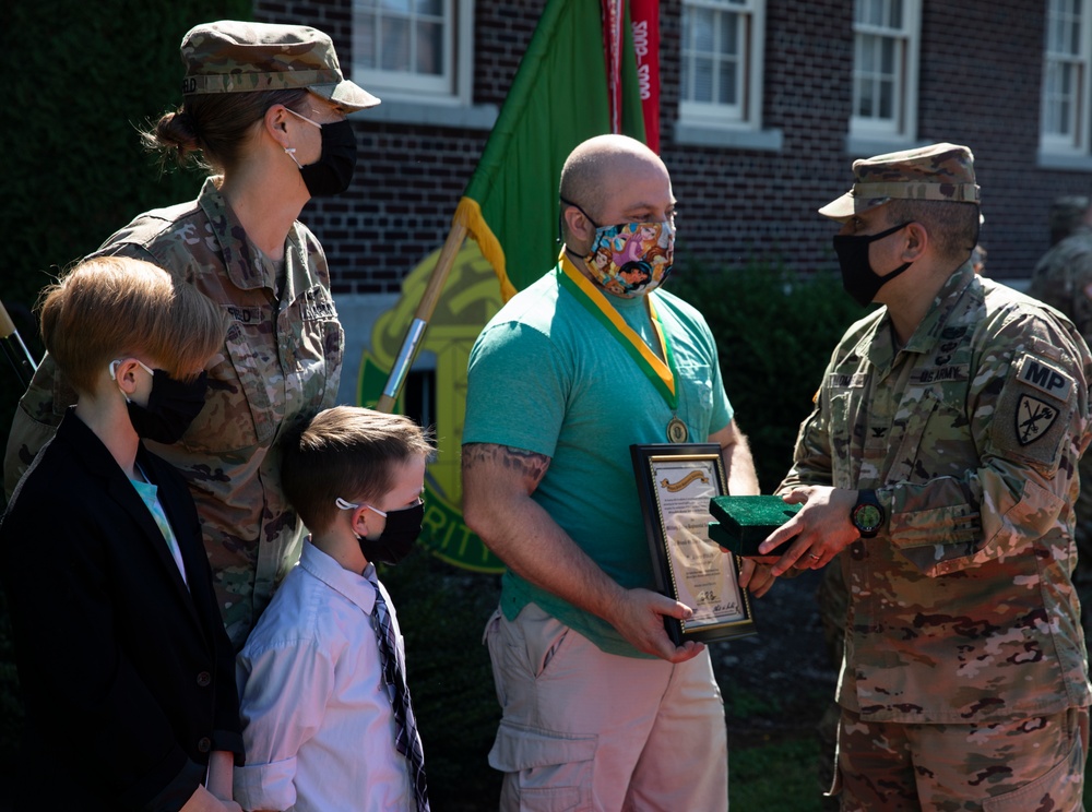 42nd MP Bde. celebrates milestones as they bid farewell to a member of the protector family