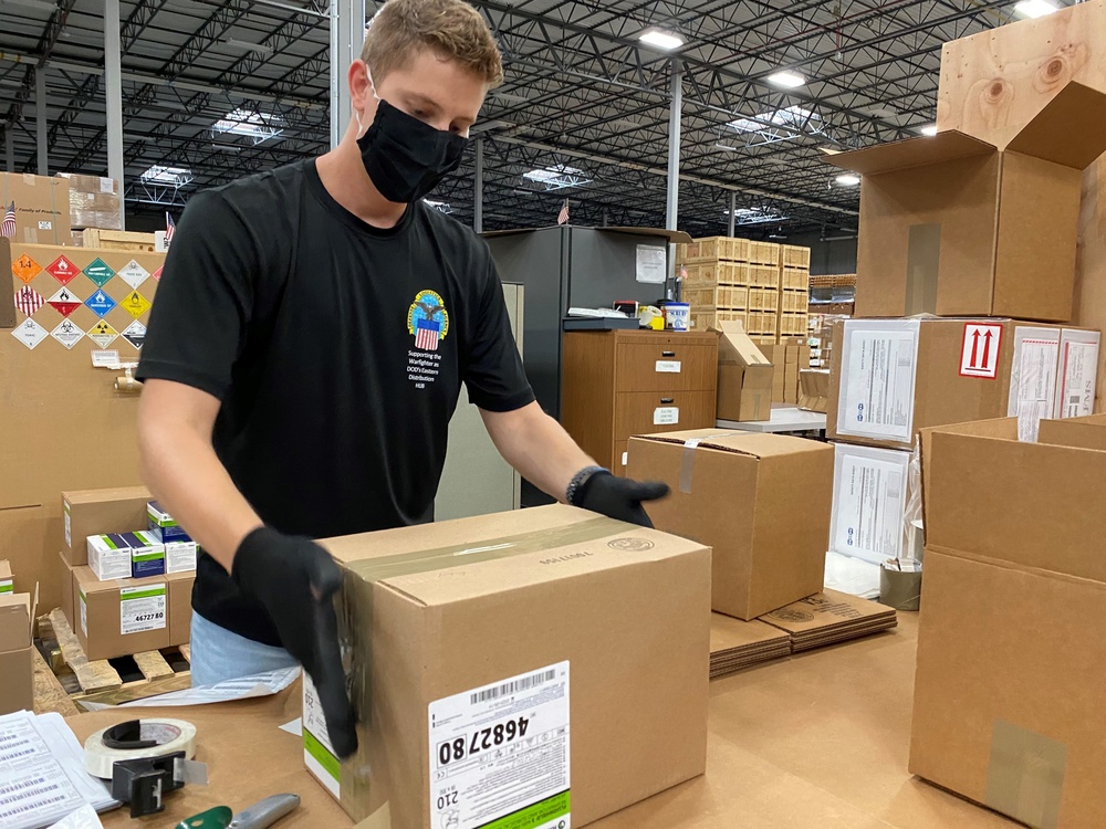 Defense Logistics Agency Distribution Susquehanna, Pennsylvania, Mission Essential Employee Seals Box of N95 respirator masks