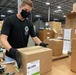 Defense Logistics Agency Distribution Susquehanna, Pennsylvania, Mission Essential Employee Seals Box of N95 respirator masks