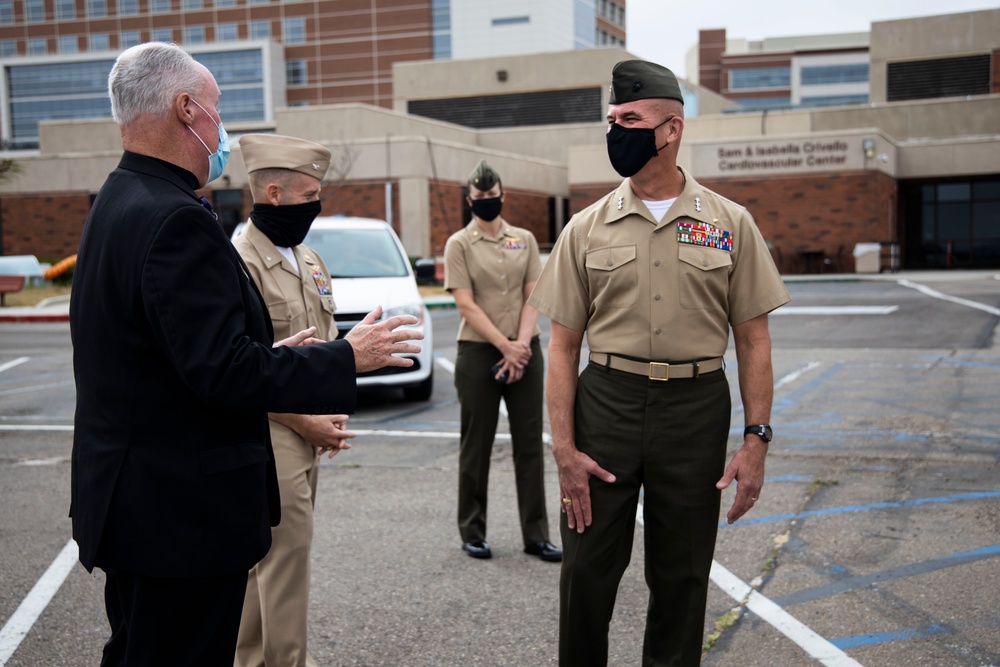 I MEF leaders thank healthcare workers with coins, plaque