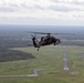 Wisconsin Army National Guard UH-60 Black Hawk helicopters from the 1st Battalion, 147th Aviation perform a military flyover in honor of U.S. Army Cpl. Francis J. Rochon.