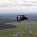 Wisconsin Army National Guard UH-60 Black Hawk helicopters from the 1st Battalion, 147th Aviation perform a military flyover in honor of U.S. Army Cpl. Francis J. Rochon.