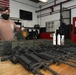 HSC-85 Aviation Ordnanceman Prepares M-240 Machine Guns for Mounting to Aircraft Prior to Flight Operations
