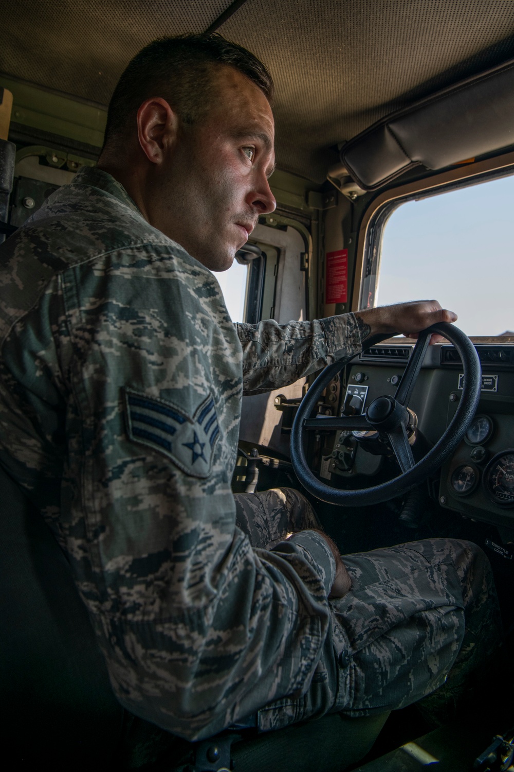 Humvee driving with 932nd CES